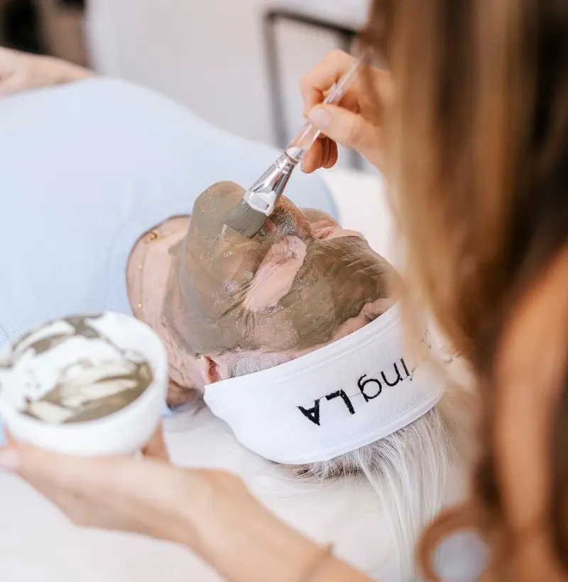 up close photo of facial service being done